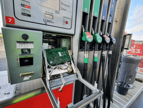 Open dispenser electronics panel during service