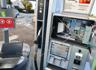 Technician laptop connected to a Circle K dispenser