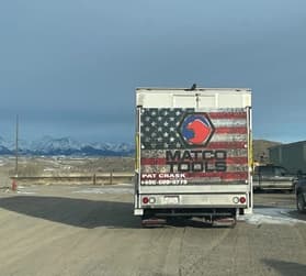 Matco Tools truck rear view with mountains